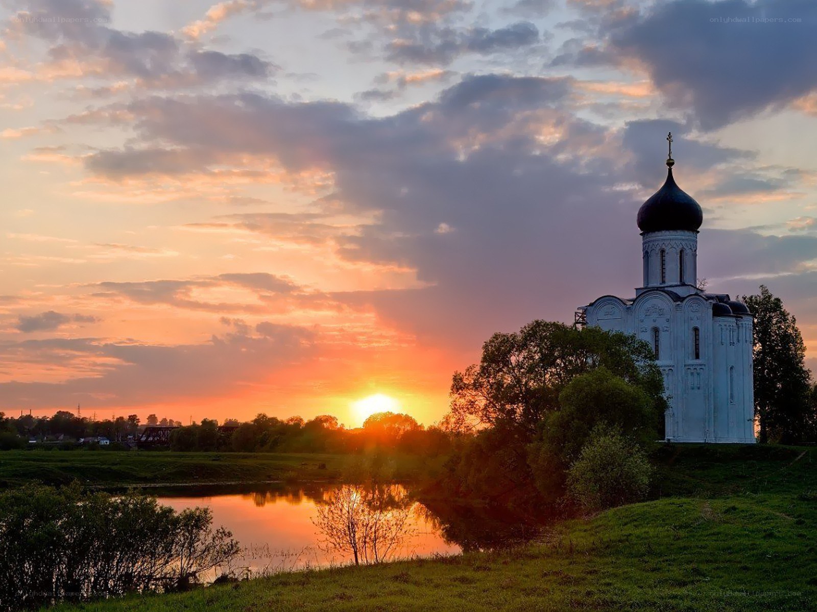 Church at sunset by the river