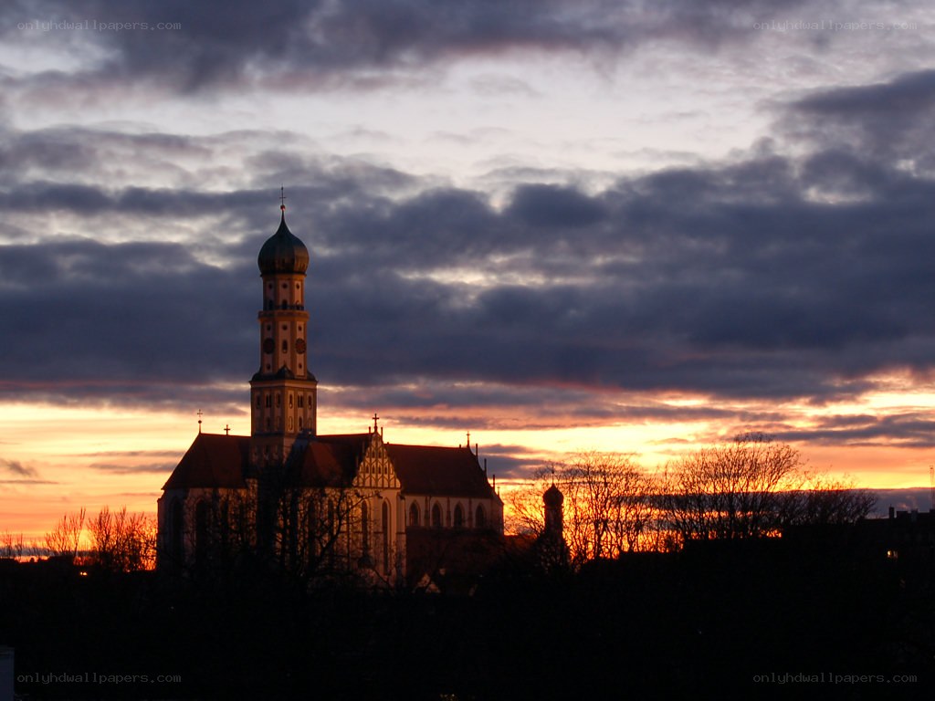 Church at sunset with dramatic sky