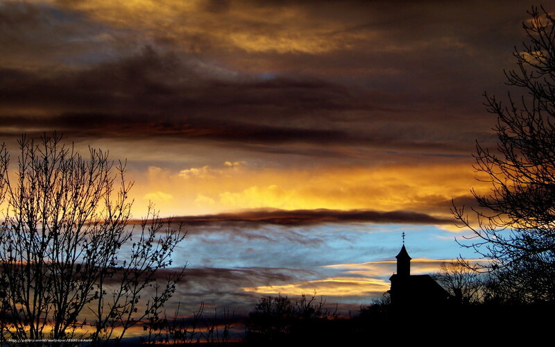 Church at sunset with dramatic sky