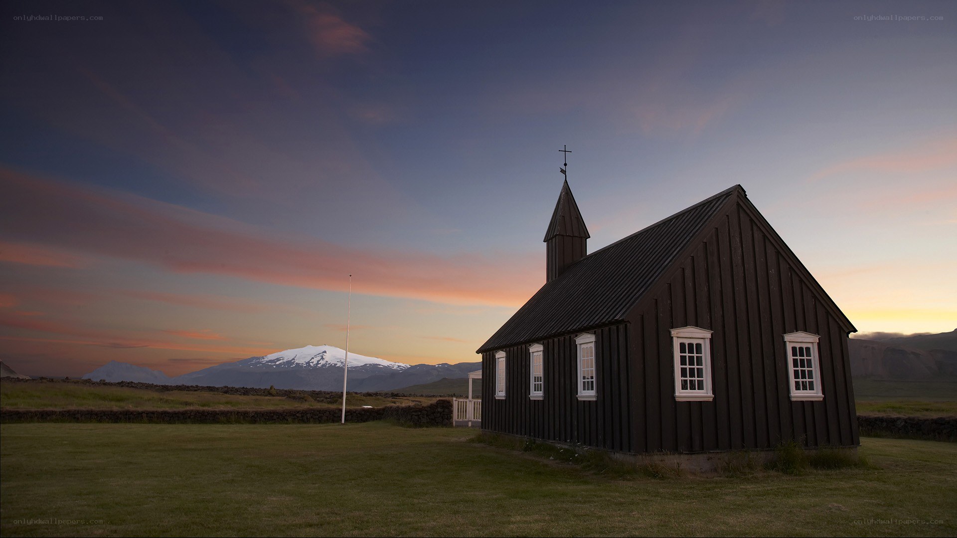 Church at sunset with mountain