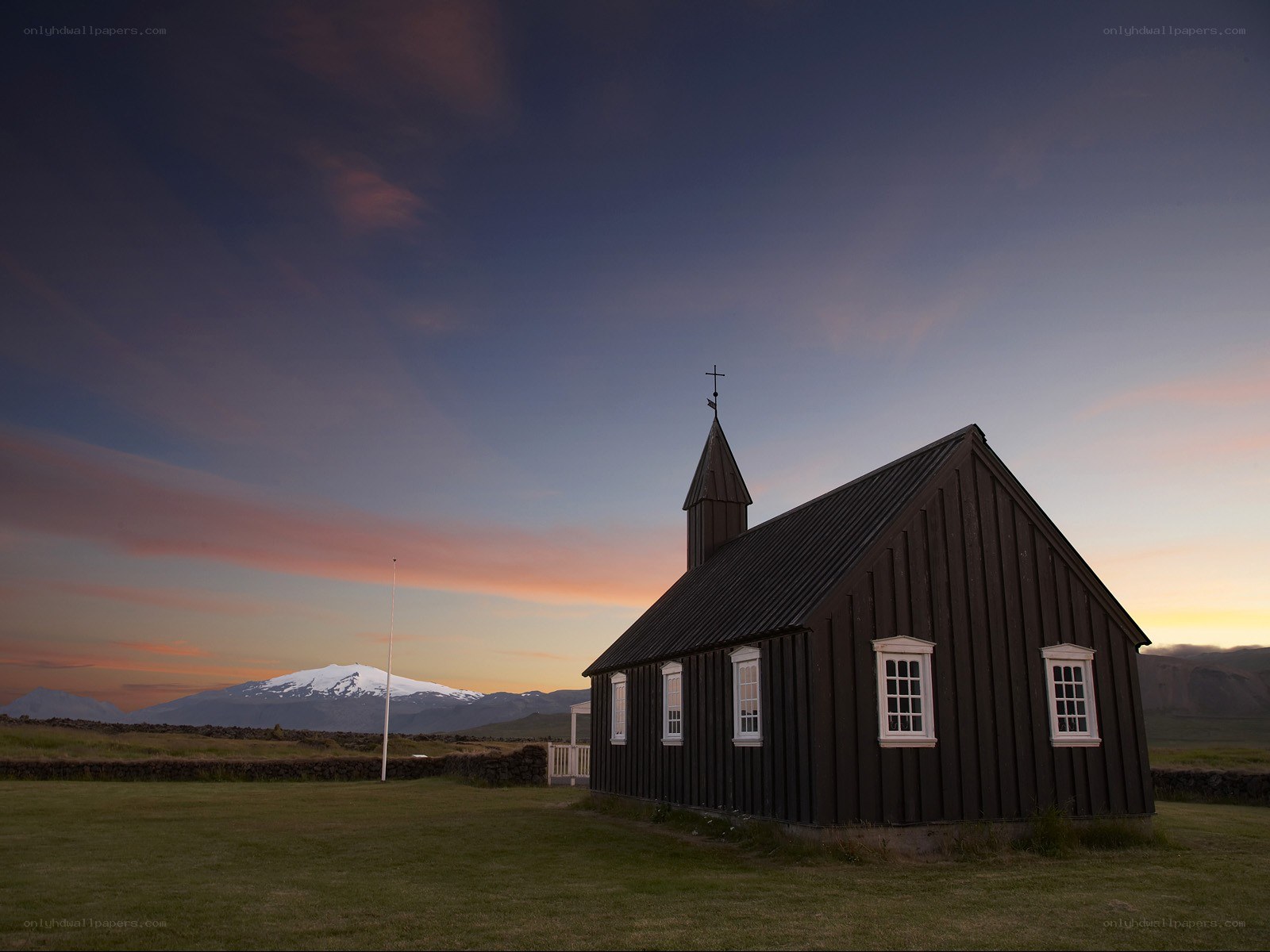 Church at sunset with mountain