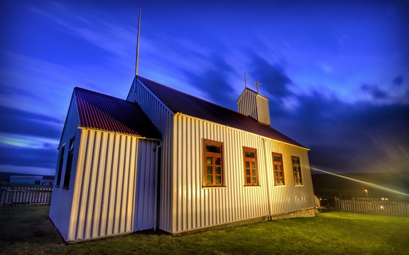 Church at twilight with aurora