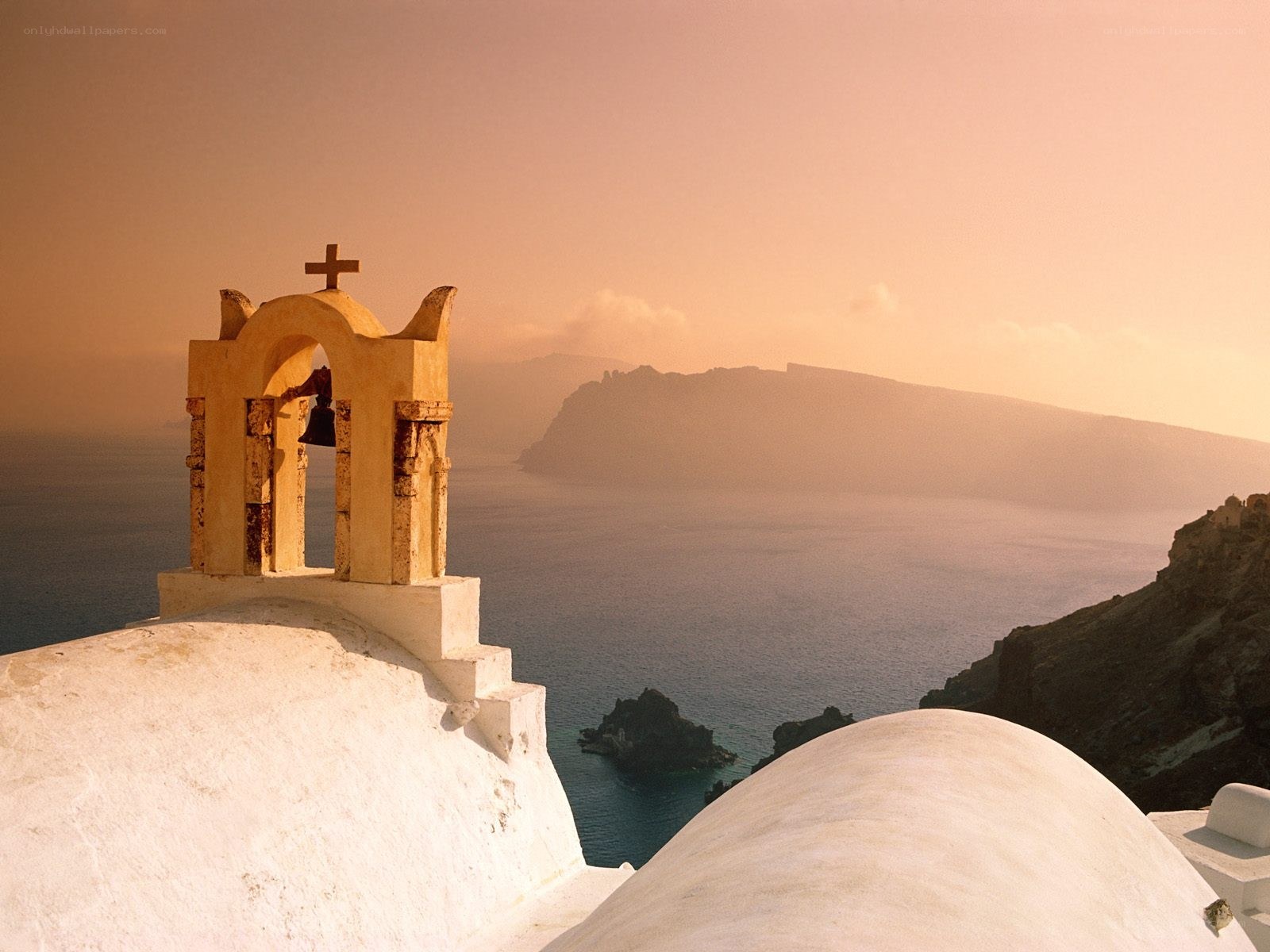 Church bell tower overlooking the sea
