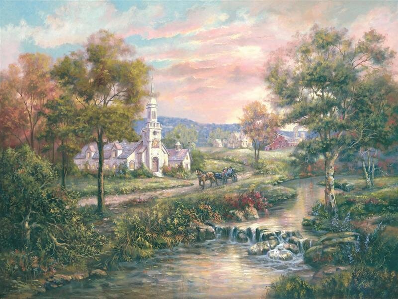 Church by a stream at sunset