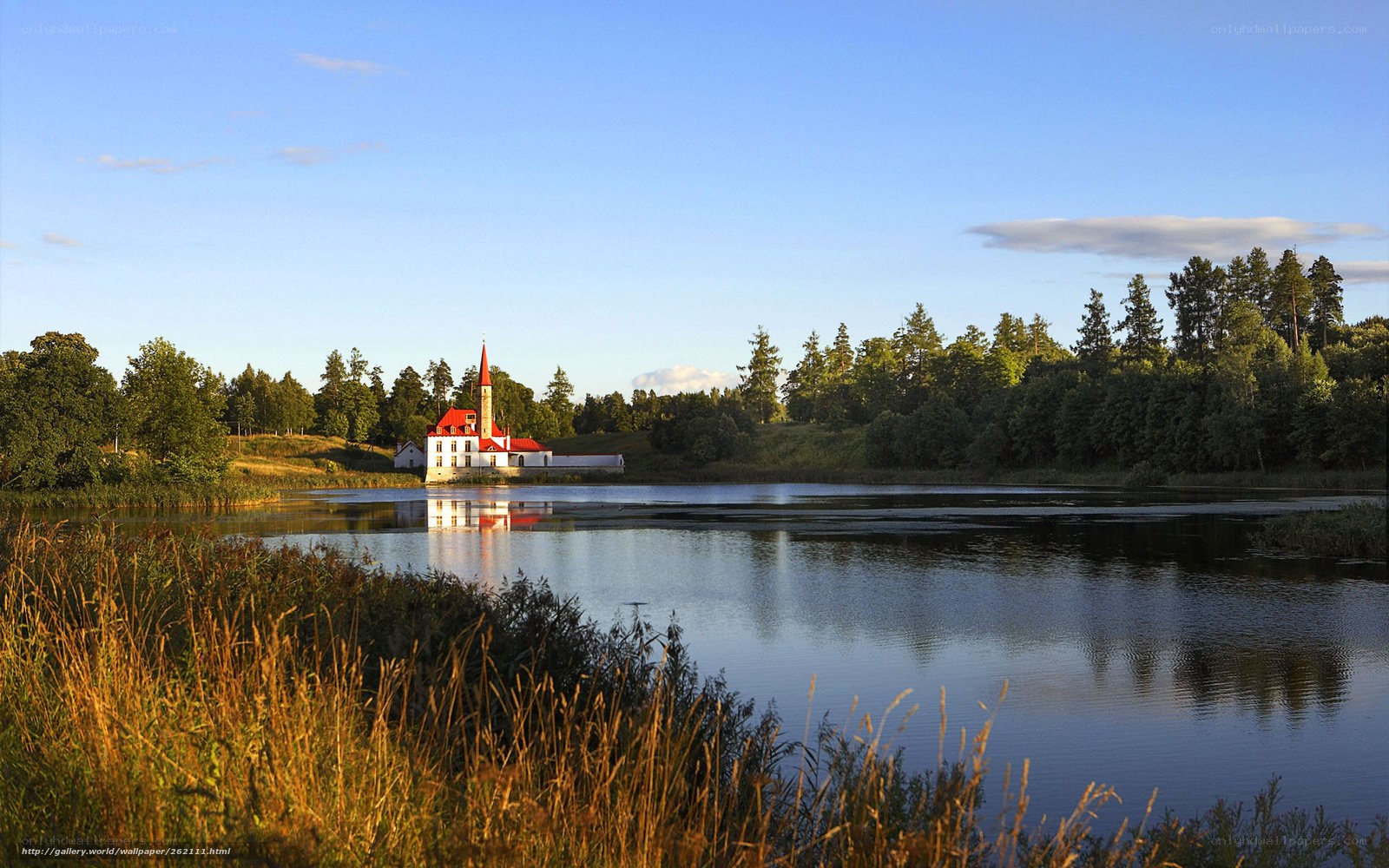 Church by the lake at sunset