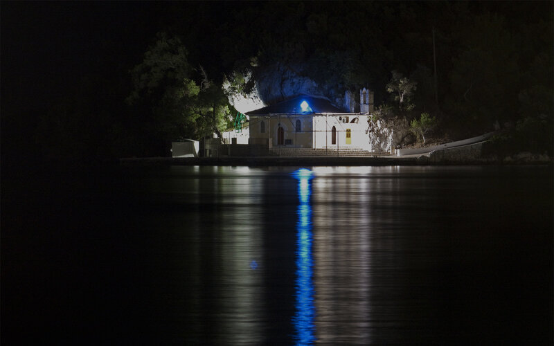 Church by the water at night
