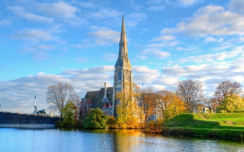 Church by the water in autumn