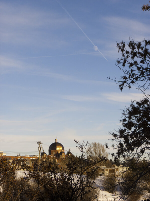 Church dome in winter landscape