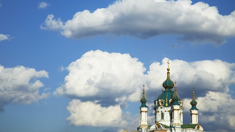 Church domes against blue sky