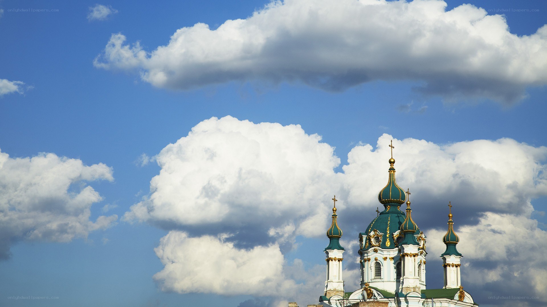Church domes against blue sky