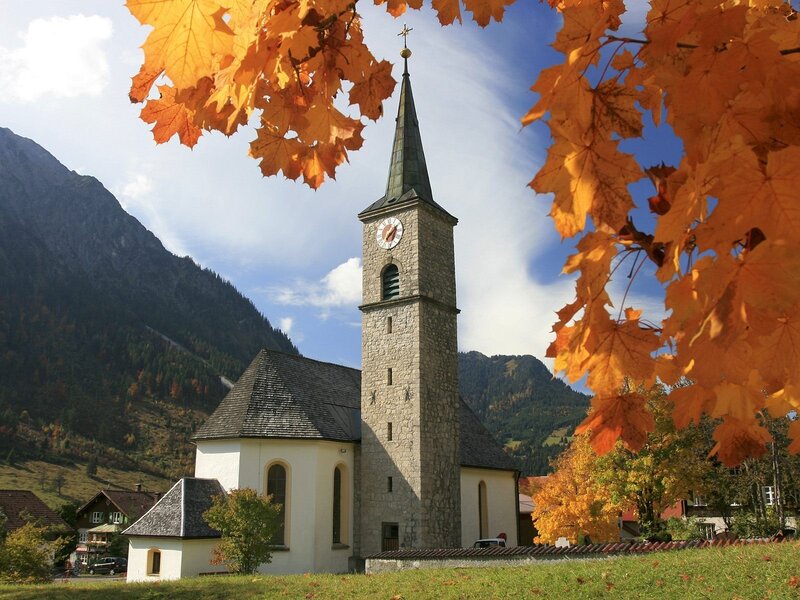 Church in autumnal mountain village