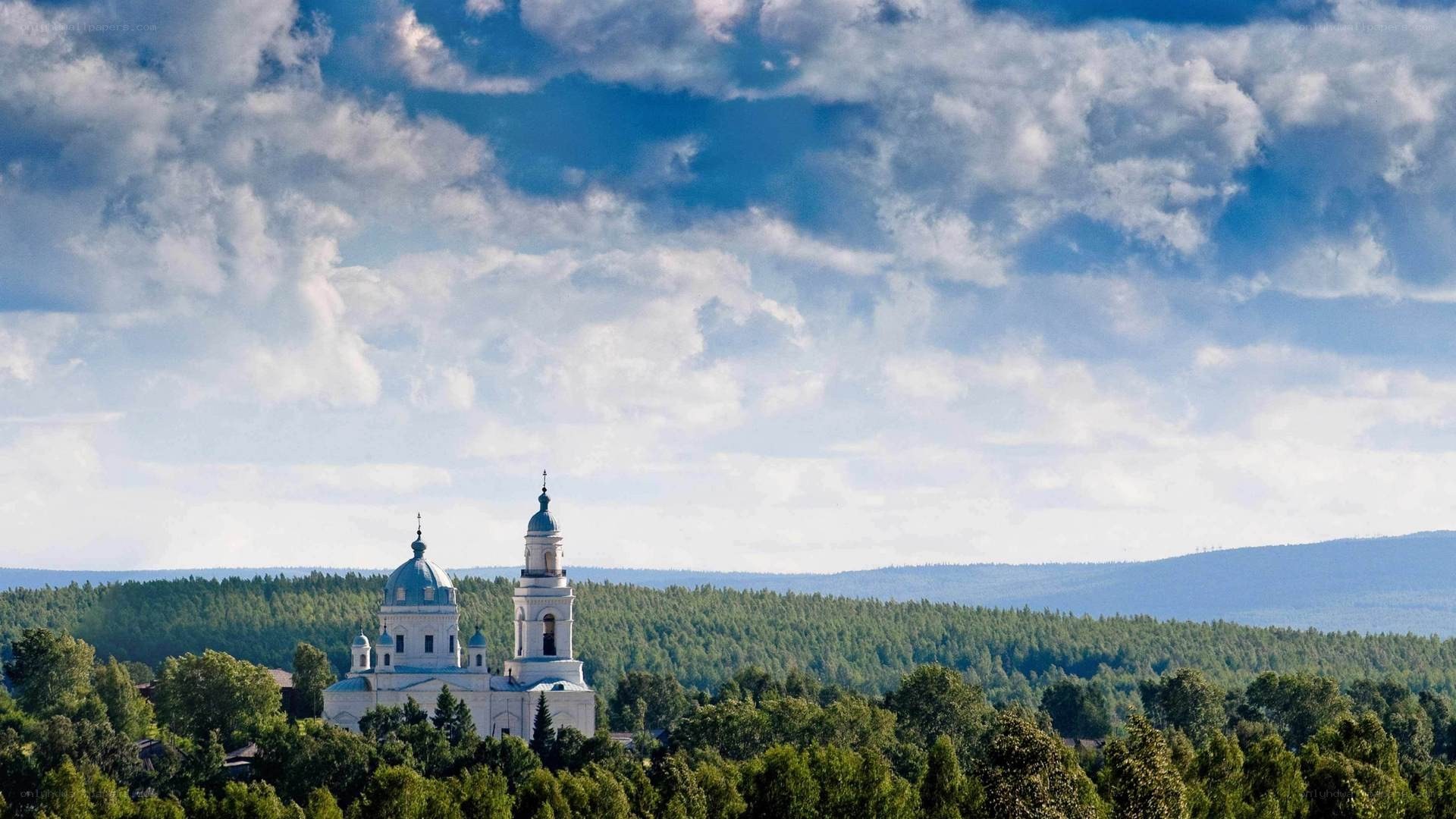 Church in forested landscape