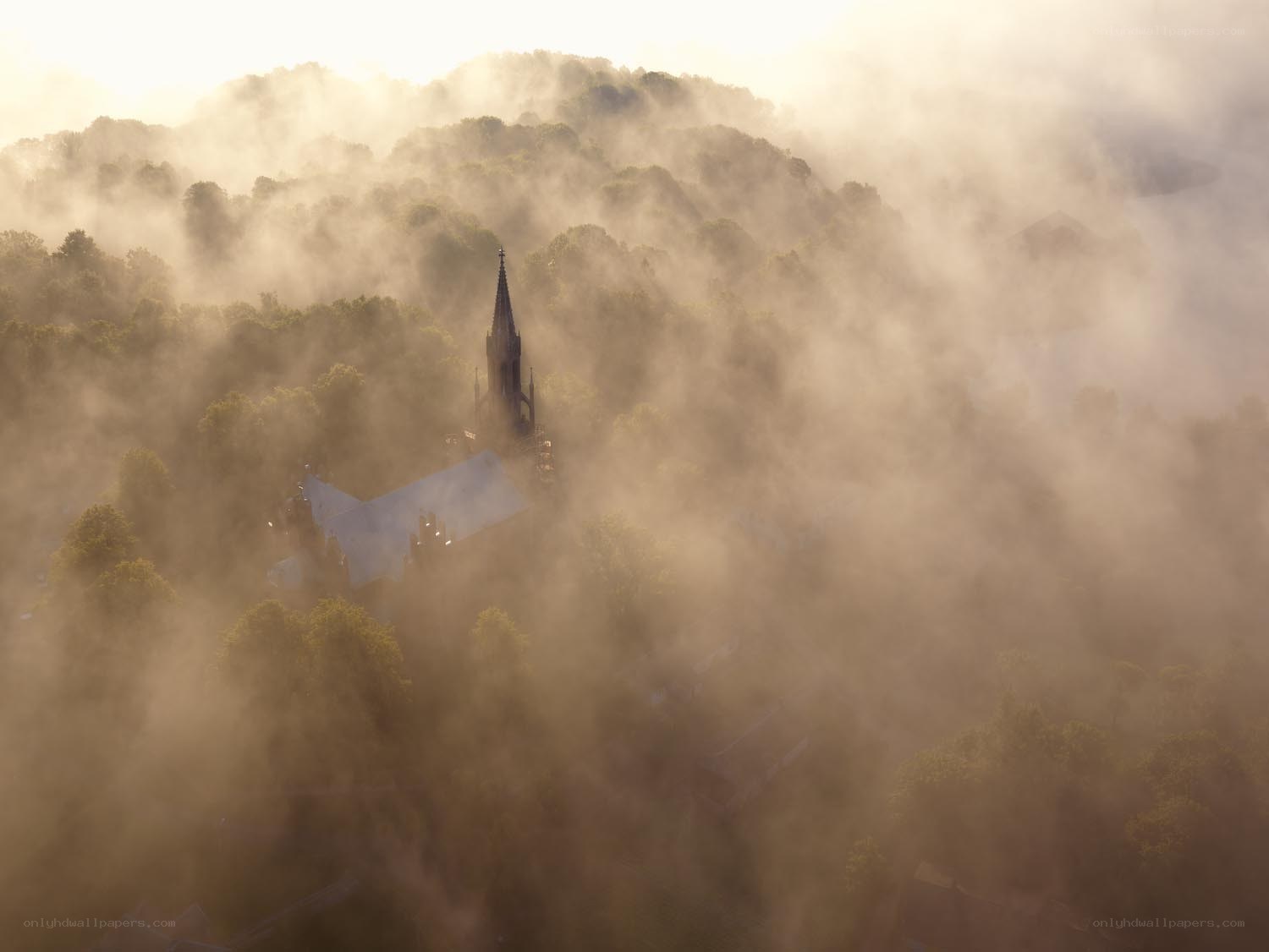Church in morning mist