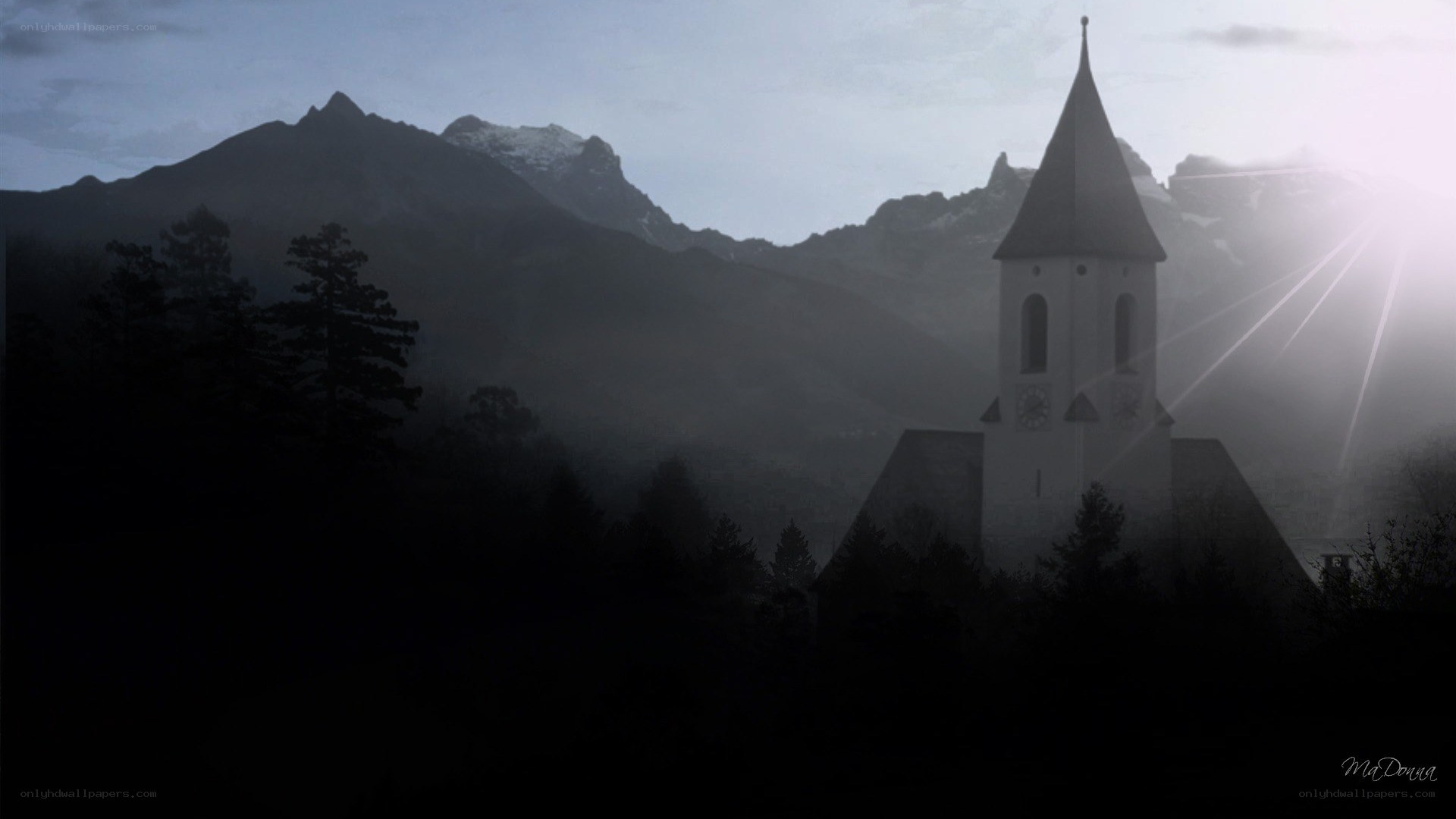 Church in mountain valley at dawn