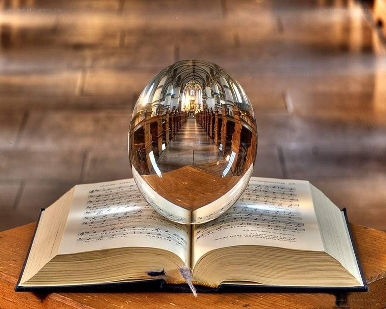 Church interior reflected in a crystal ball