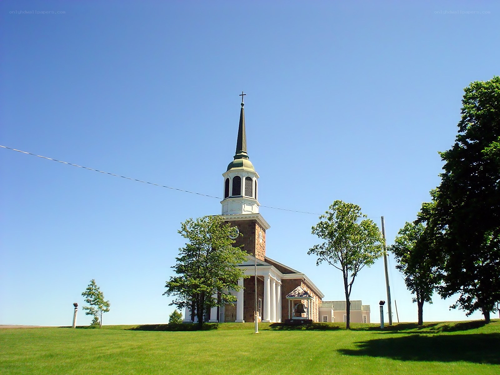 Church on a grassy hill