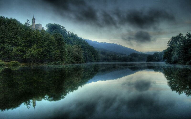 Church on a hill by the lake