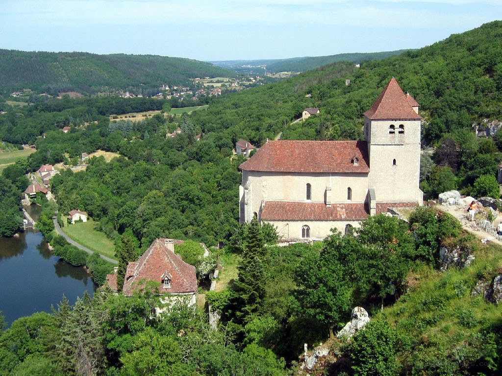 Church on a hillside overlooking a river