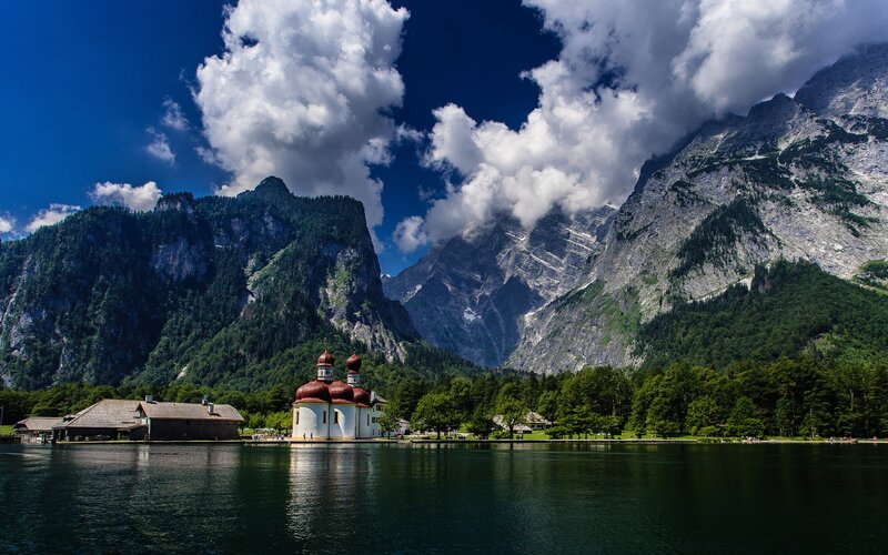 Church on a lake in the Alps