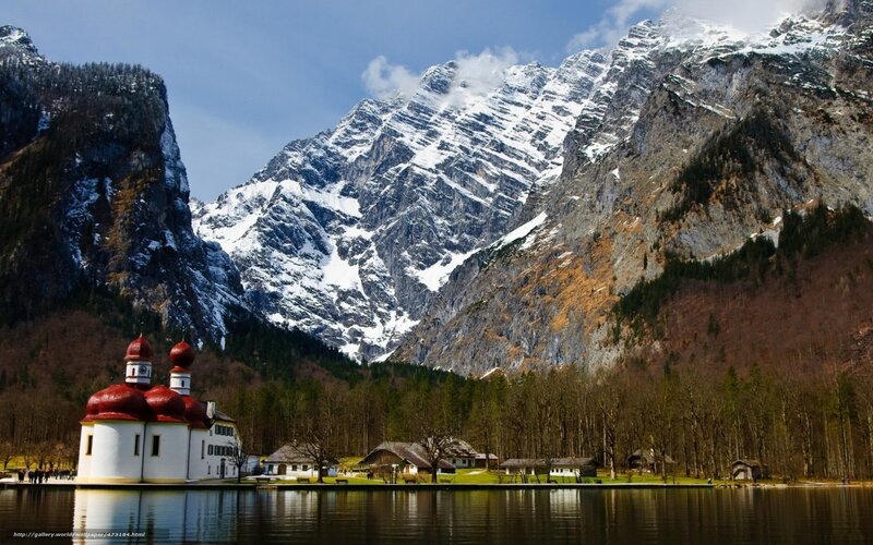 Church on a lake in the Alps