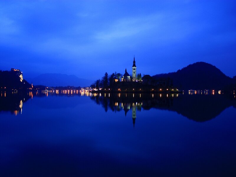 Church on a lake island at dusk