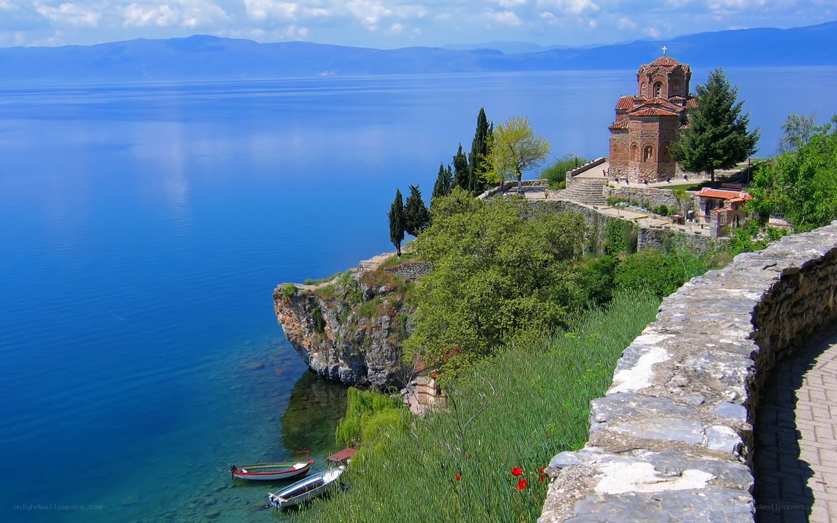 Church on a lakeside cliff