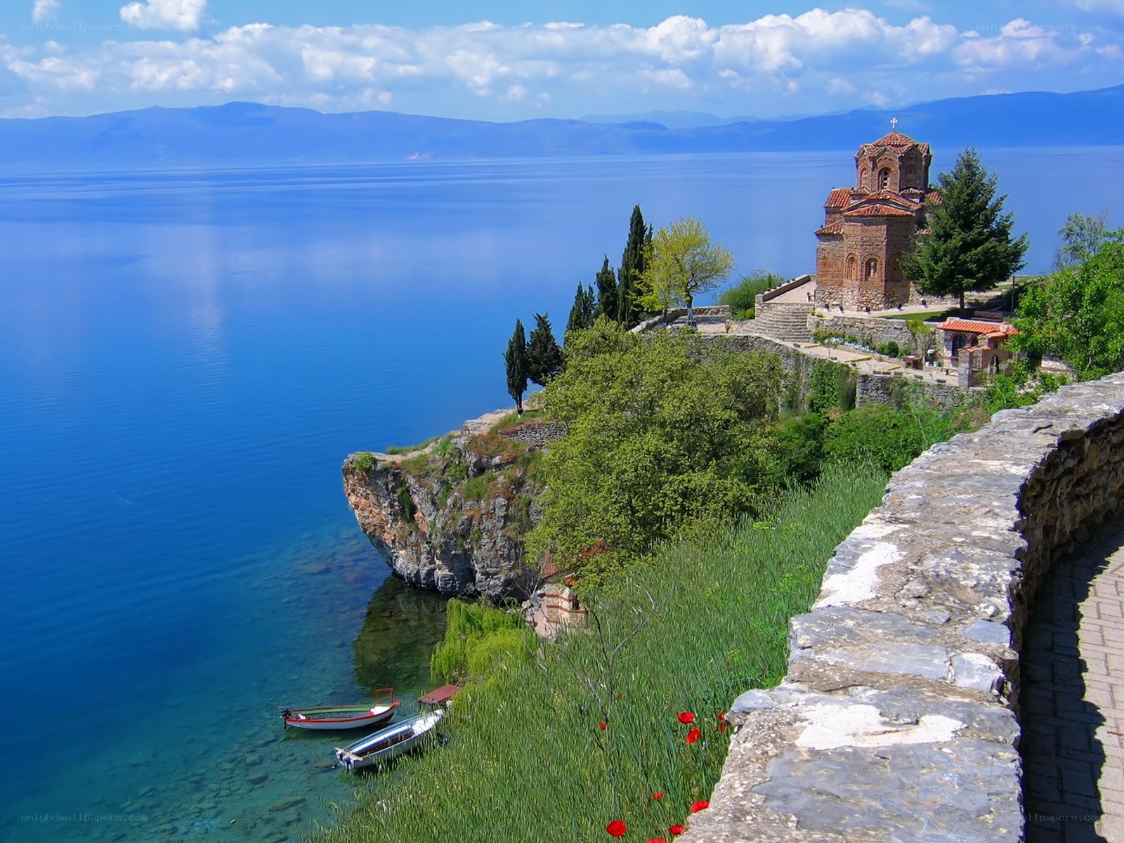 Church on a lakeside cliff