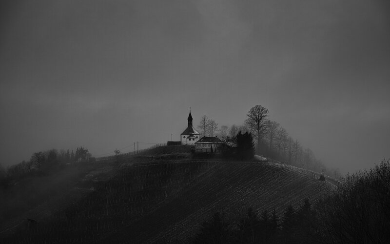 Church on a misty hill