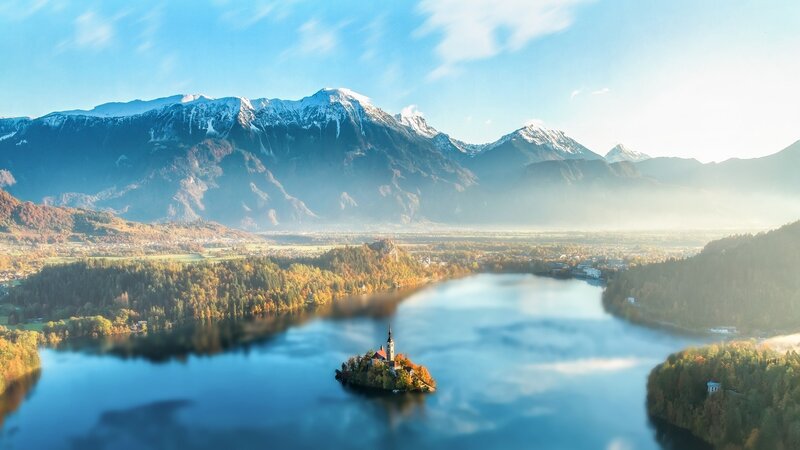 Church on Lake Island — Blue, Serene, Morning, Photograph, Mountains, Forest, Village