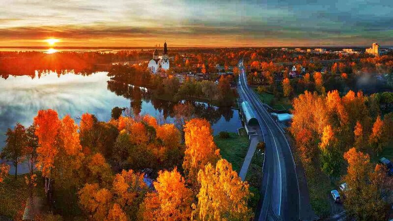 Church on Lake Island — Orange, Serene, Sunrise