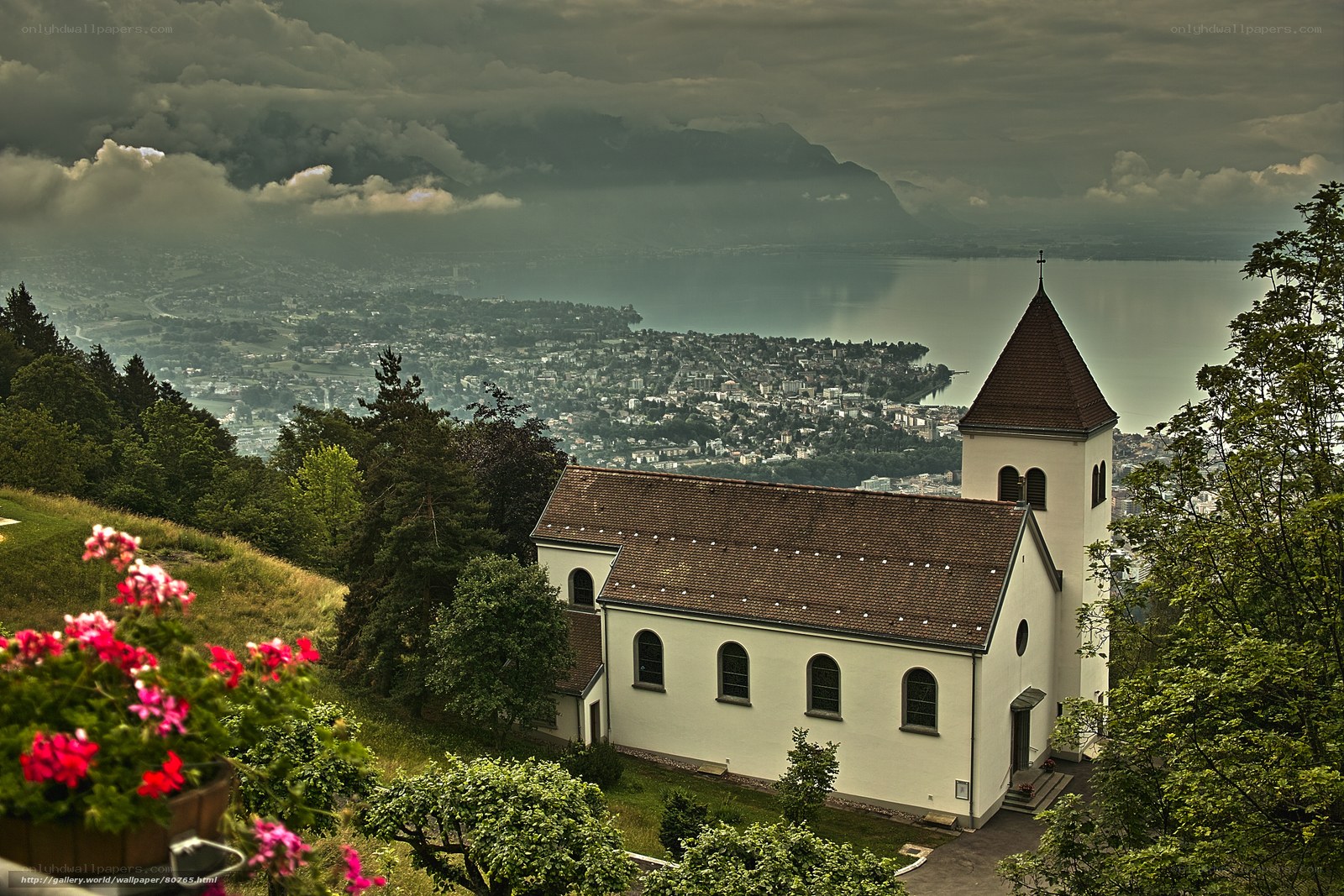 Church overlooking a lake and city