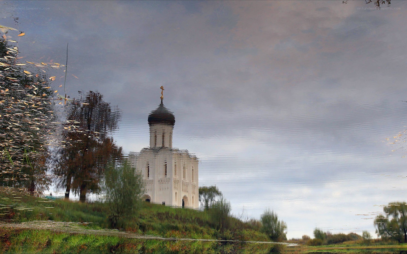 Church reflected in water