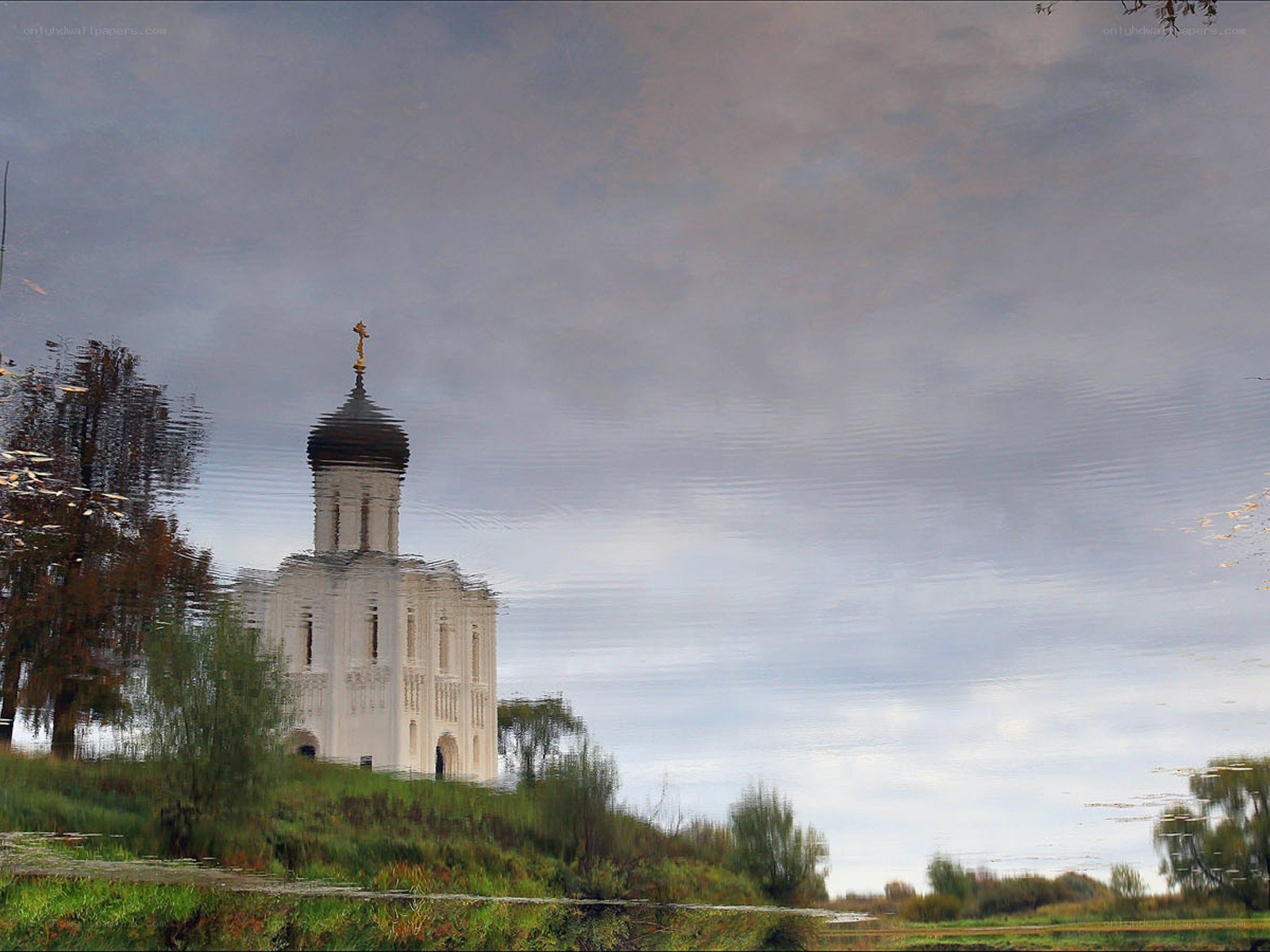 Church reflected in water