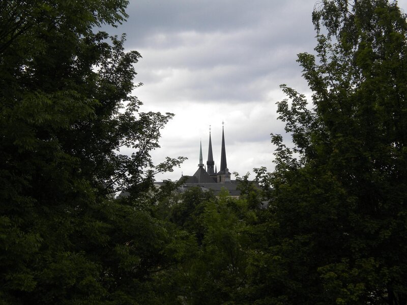 church spires through trees