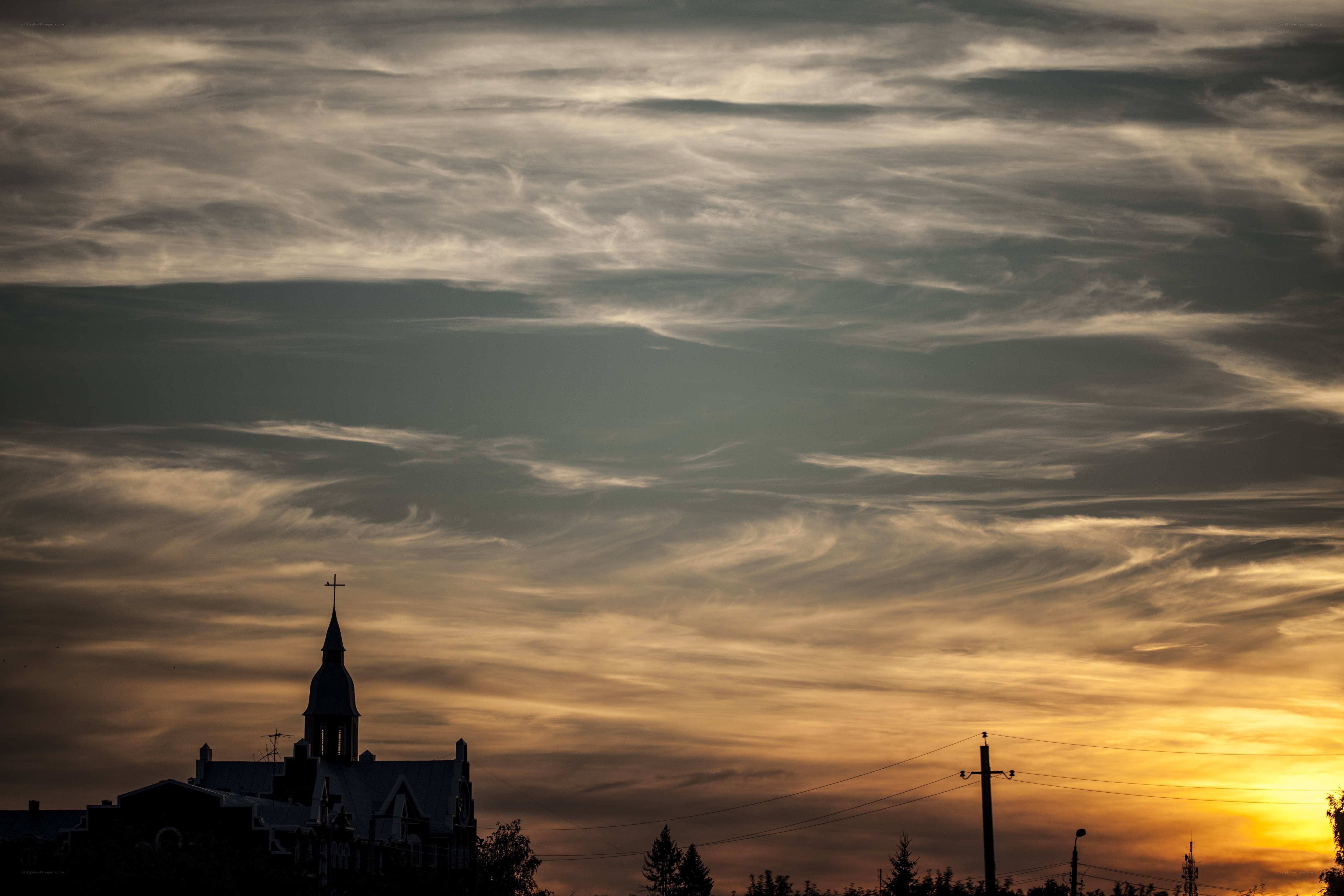 Church steeple at sunset