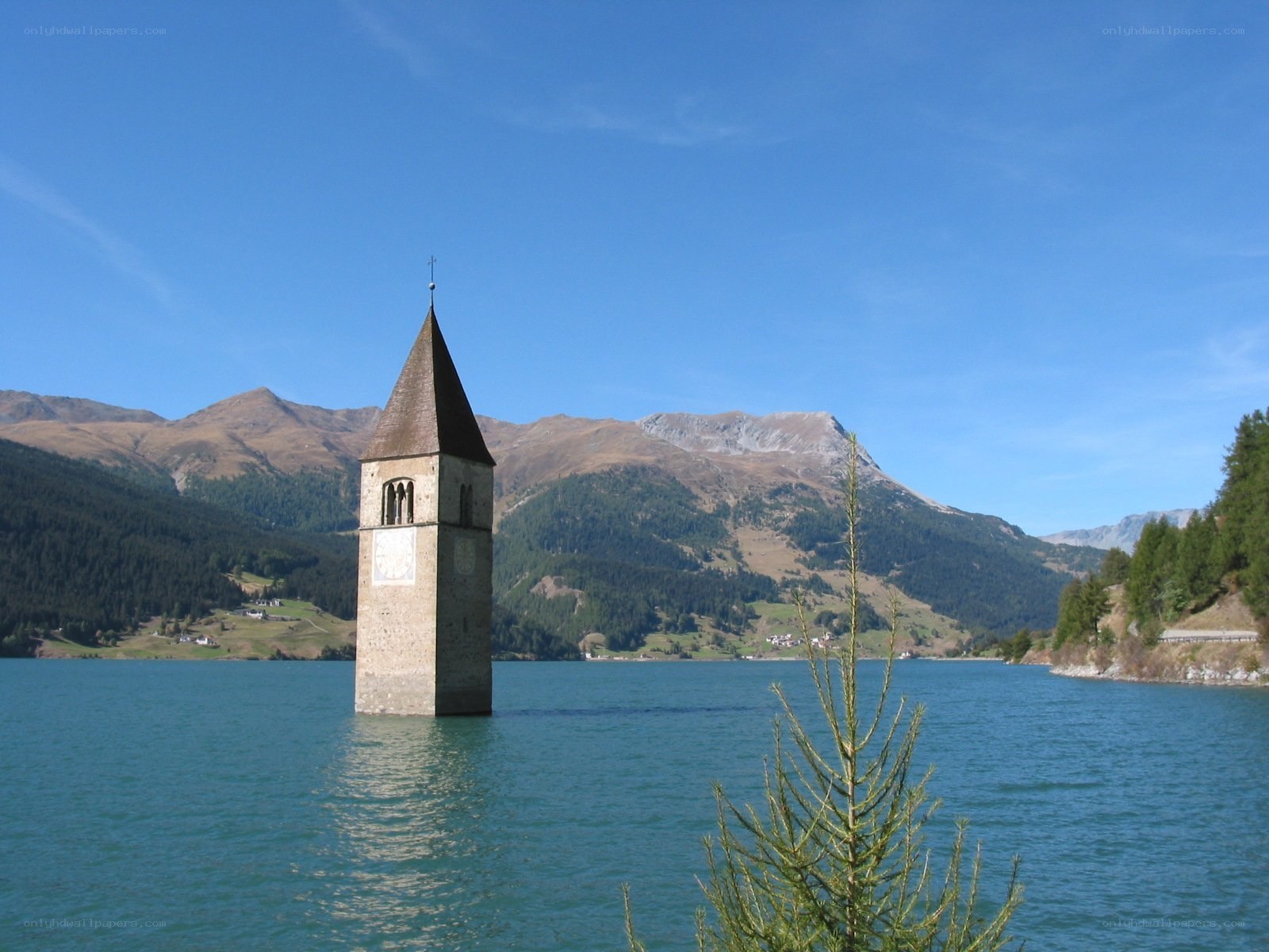 Church tower in a lake