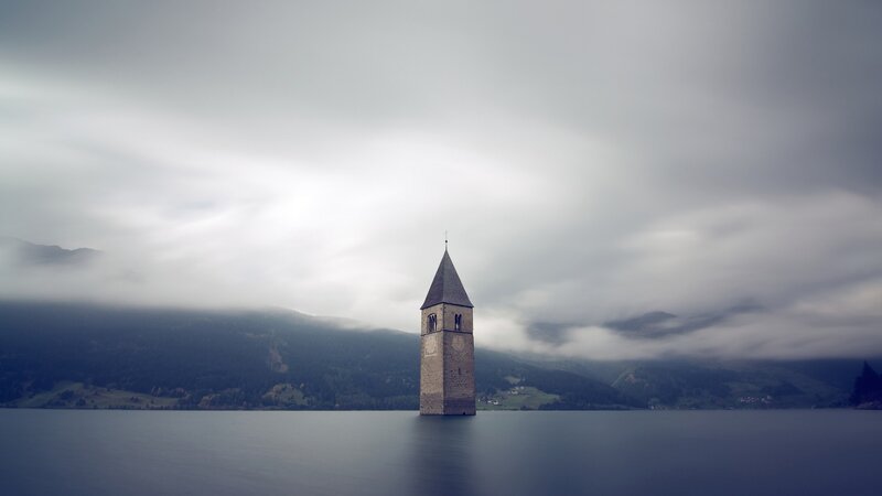 Church Tower in Lake — Gray, Serene