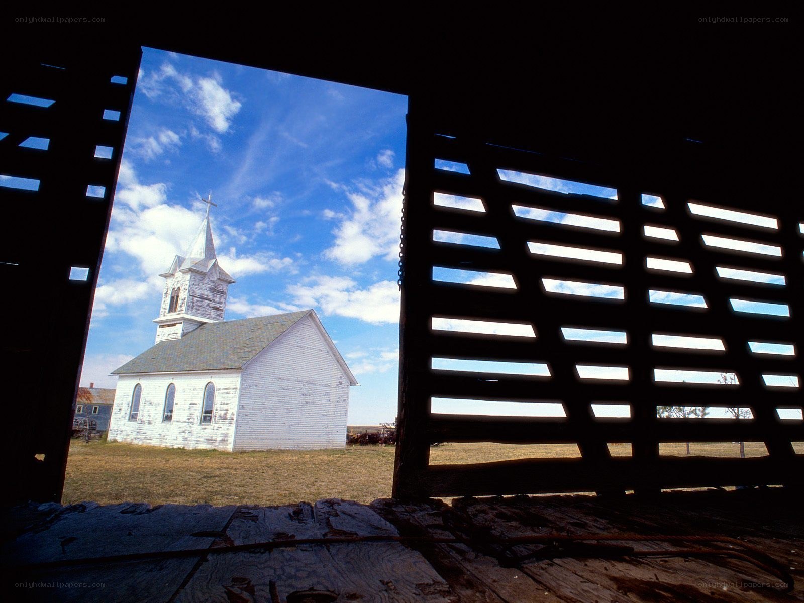 Church viewed from a barn
