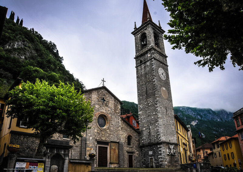 Church with bell tower in mountain village
