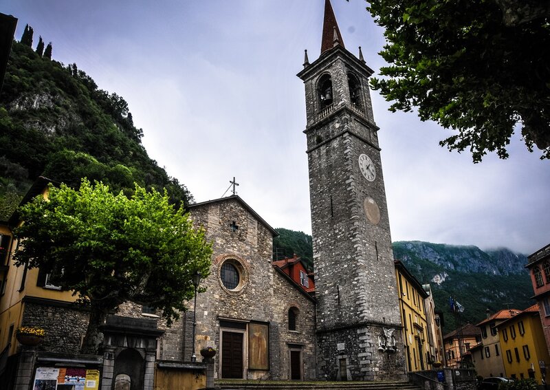 Church with clock tower in mountain village