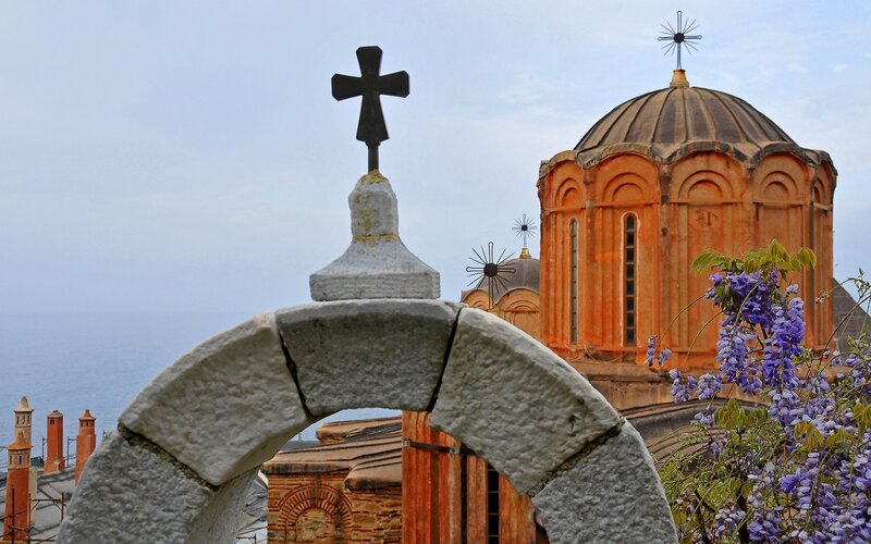 Church with cross and wisteria