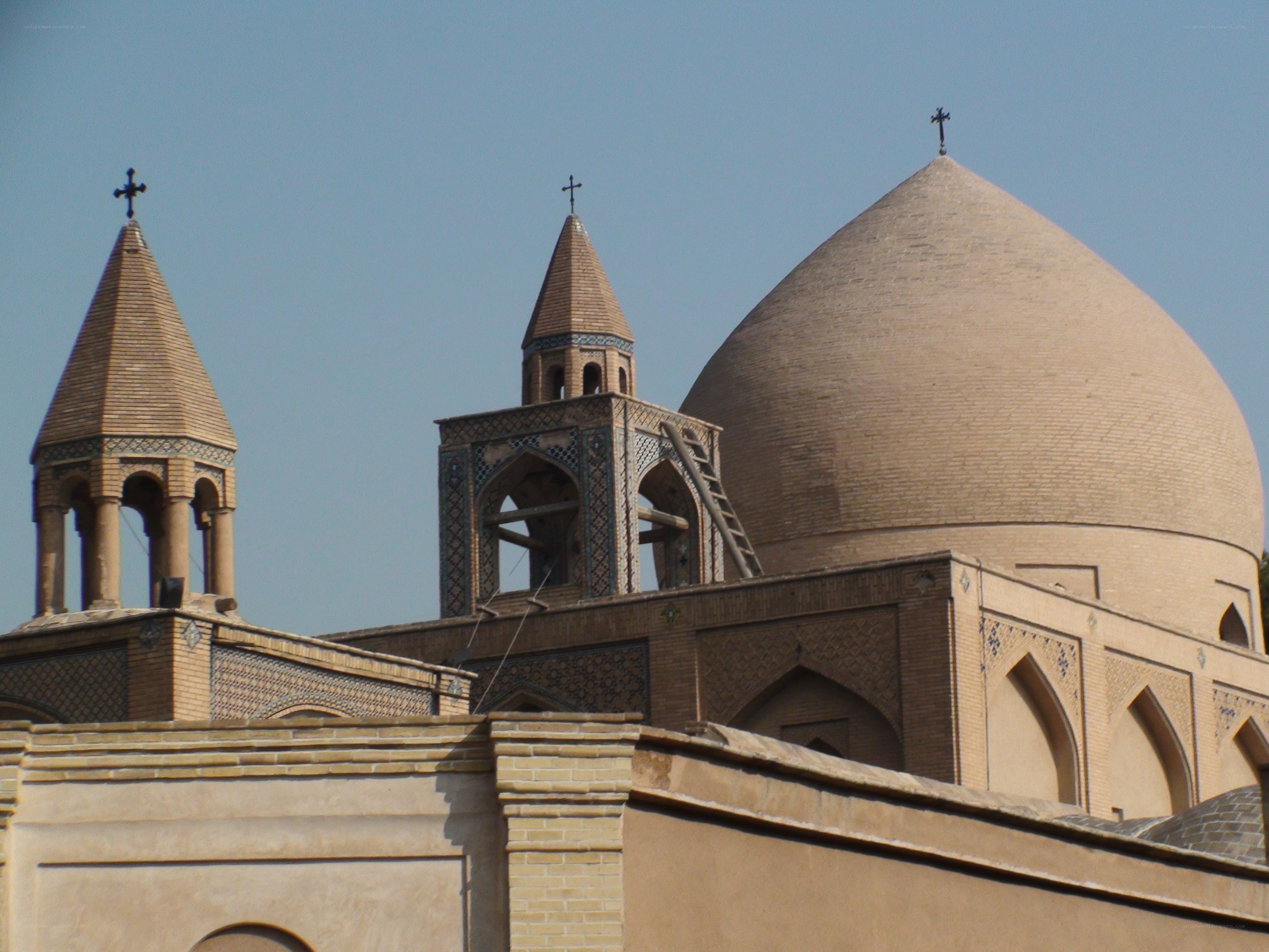 church with domes and crosses