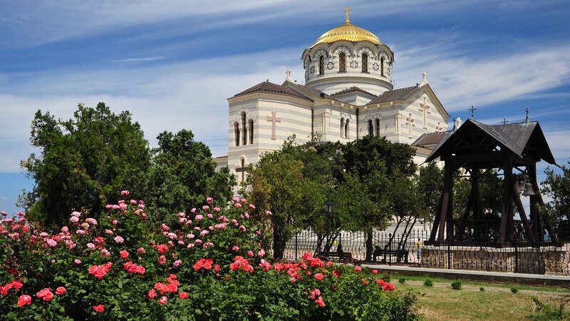 Church with golden dome and roses