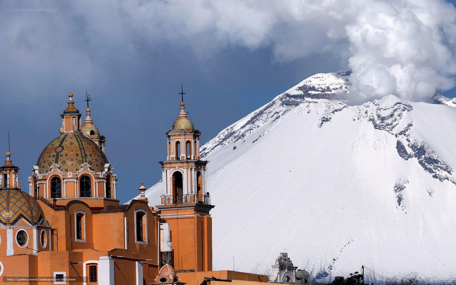 Church with snow-capped volcano