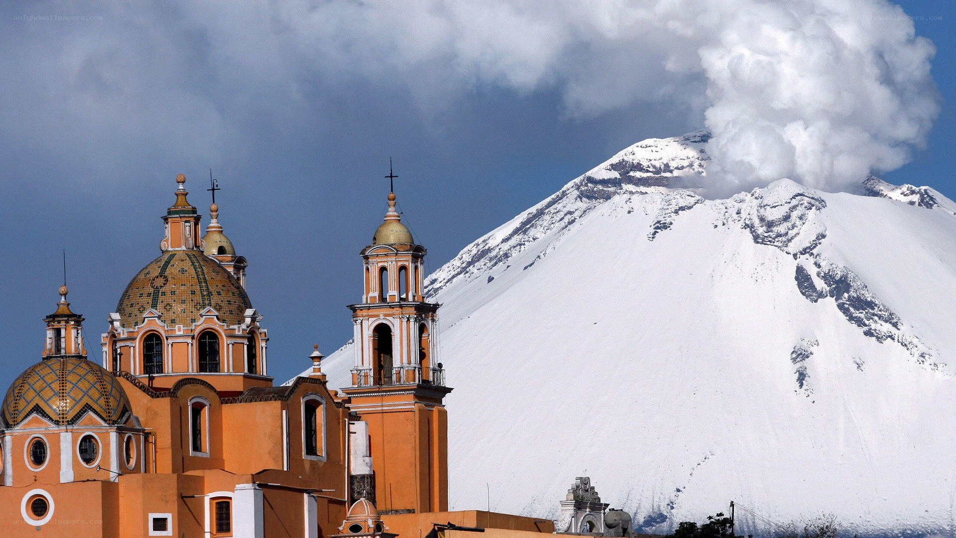 Church with snowy volcano