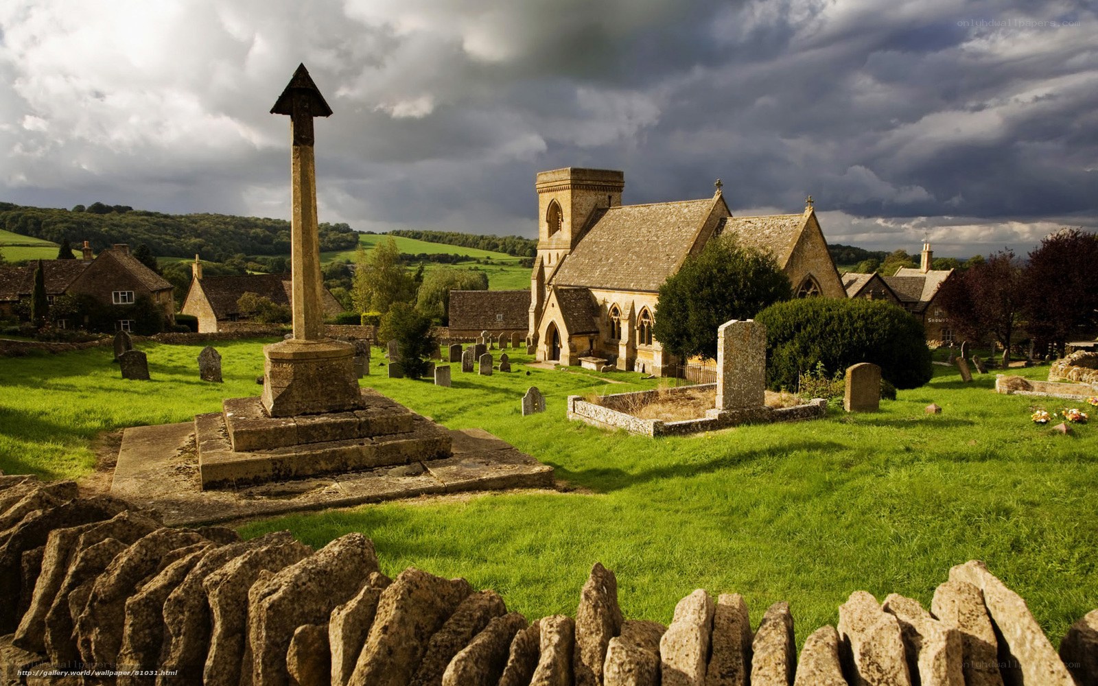 Churchyard under stormy sky