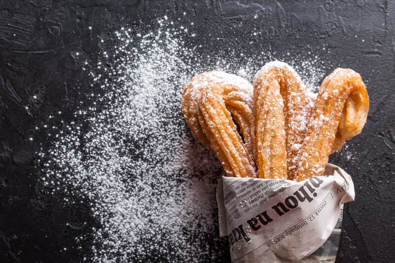 Churros with powdered sugar