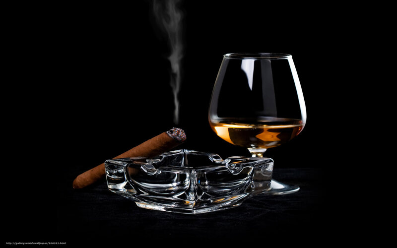Cigar and brandy on black