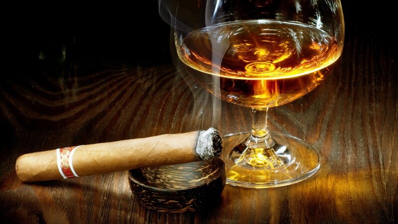 cigar and brandy on wood