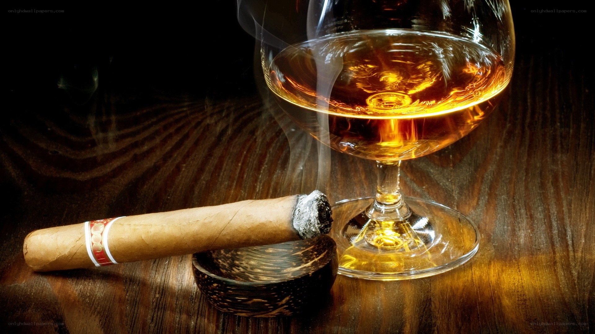 cigar and brandy on wood